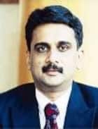 Dr Tilak Suvarna