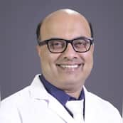 Dr. Sujit Kumar is the Director & Senior Consultant – Neurology at KIMS Hospitals, Electronic City, Bengaluru. As a highly accomplished neurologist and epileptologist, he brings over 19 years of post-qualification experience (16+ years as a neurology super-specialist) to complex brain, spinal cord, and nerve care.Dr. Kumar completed his MBBS from Bangalore University in 1999, followed by an MD in General Medicine from St. John's Medical College in 2004. He then earned his DM in Neurology from the prestigious PGIMER, Chandigarh.His clinical expertise spans advanced stroke management, neuro-interventions, neuro-ophthalmology, and cognitive disorders like dementia. A pioneer in functional neurosurgery, he possesses over 11 years of experience in Deep Brain Stimulation (DBS) for Parkinson’s disease and dystonia. He also specializes in medically refractory epilepsy, managing complex cases with video-EEG tracking.