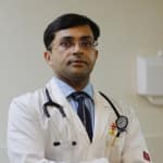 Dr. Vikas Mittal is a senior pulmonologist and sleep medicine specialist with over 25 years of experience in respiratory care. He currently serves as Director – Pulmonology at CK Birla Hospital, Delhi. His areas of expertise include asthma, COPD, interstitial lung diseases, and sleep-related disorders. Trained at premier institutions such as Maulana Azad Medical College and Vallabhbhai Patel Chest Institute, he has also completed a fellowship in sleep medicine from the USA. Dr. Mittal is skilled in interventional pulmonology procedures like bronchoscopy and EBUS, and is known for his patient-centric, evidence-based approach to treatment.